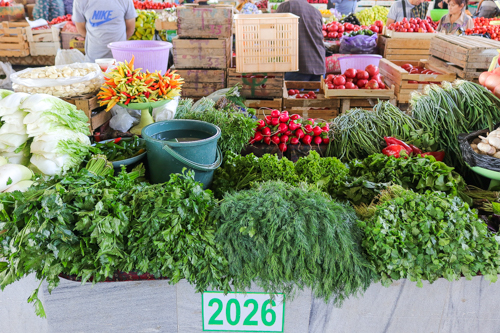 Green vegetables in a market of Uzbekistan